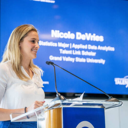 Grad student giving a presentation on LATL.